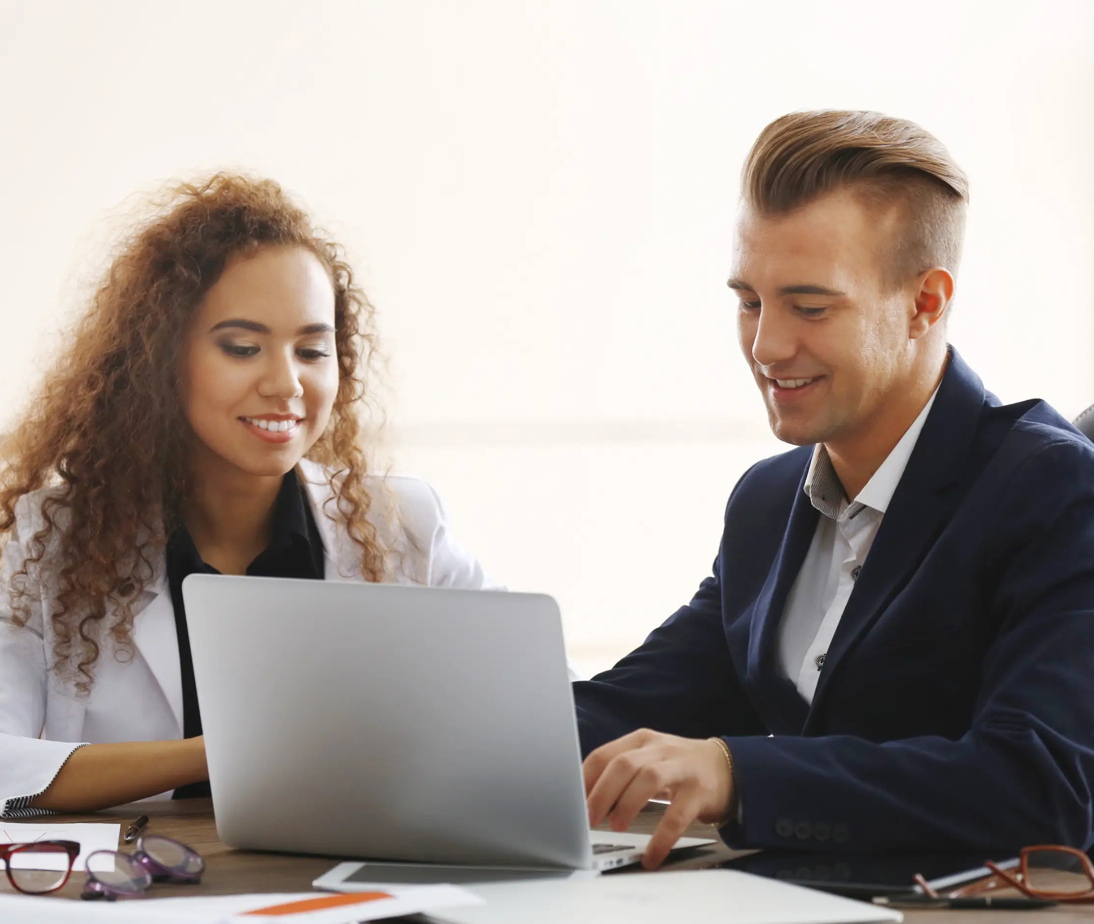 Businessman and businesswoman working in office Businessman and businesswoman working in office